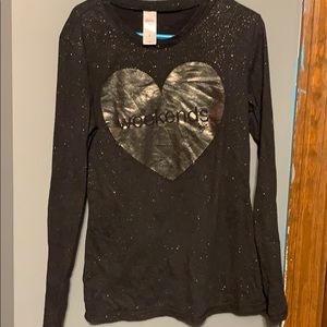 Girls long sleeve Justice shirt.
